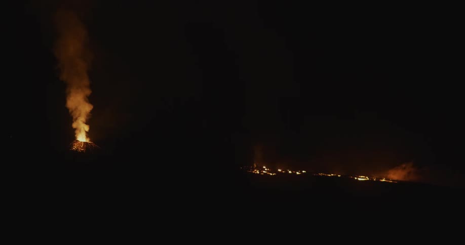 The entire area ahead is on fire at night