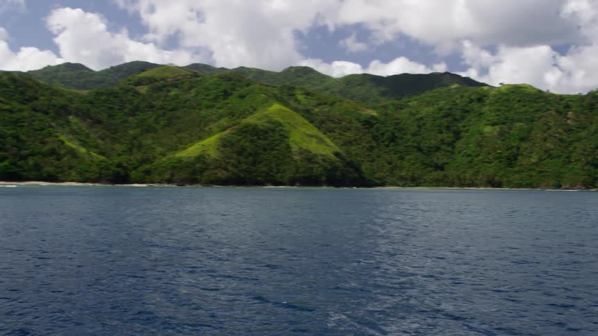 Beautiful green island on a cloudy day