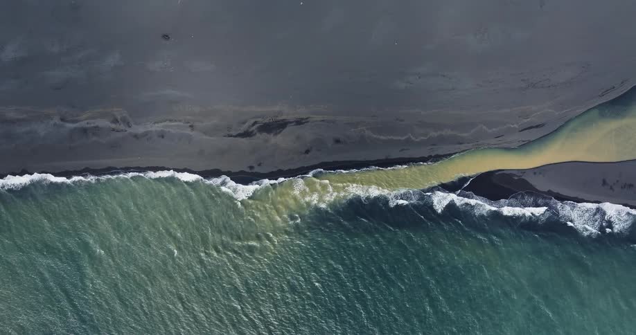 Colorful blue and yellow river with a shoreline