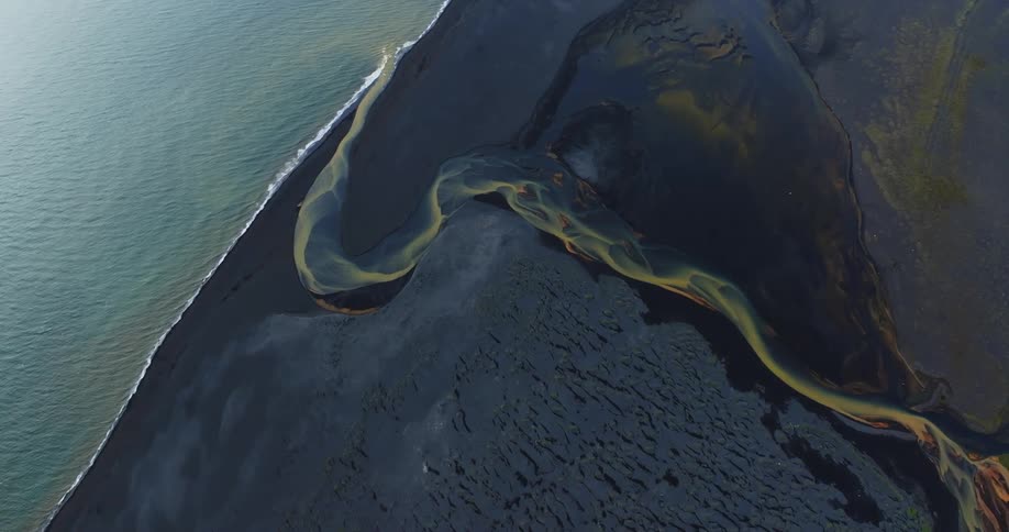 Aerial of the ocean with water with dark spots
