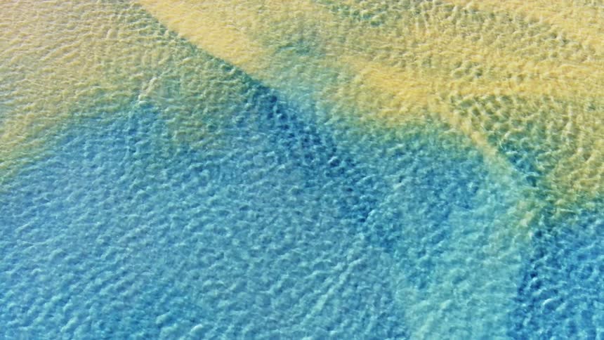 Aerial view of rivers with blue and yellow color