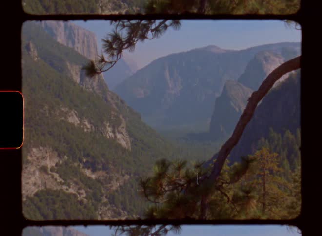 Wild scenery of forest and mountains with clear sky