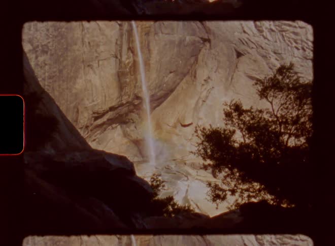 A waterfall with clear water at midday