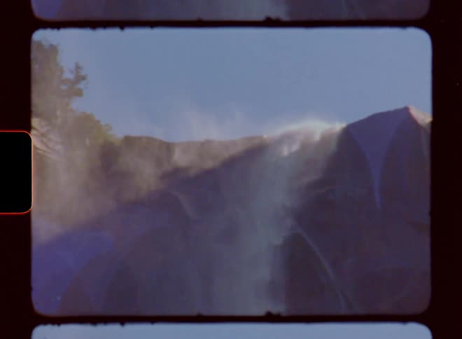 A waterfall falling during the hot day