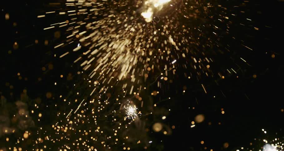 Fireworks bursting in the dark night sky