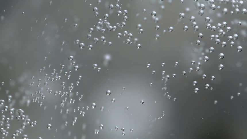 Bubbles shoot into the water