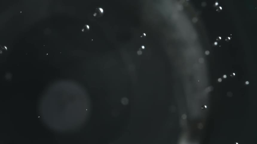 Water droplets dripping down
