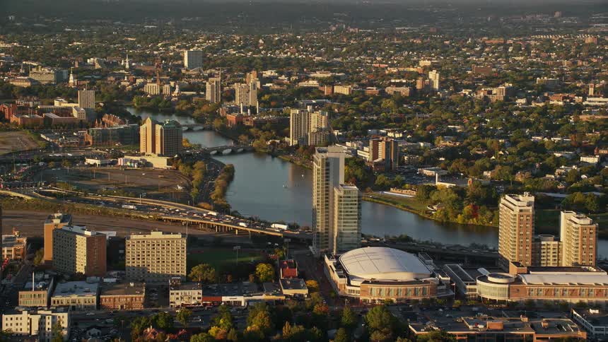 An aerial view of a large metropolitan area with a river