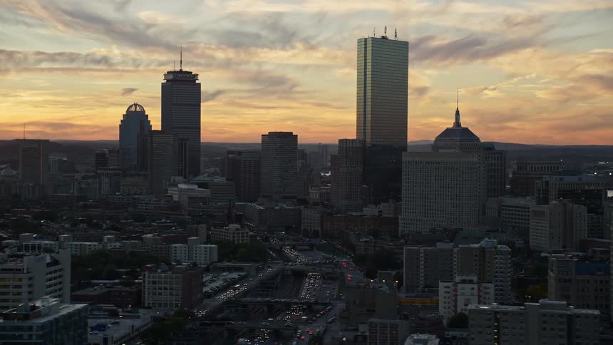 Aerial view of a city skyline dominated by skyscrapers