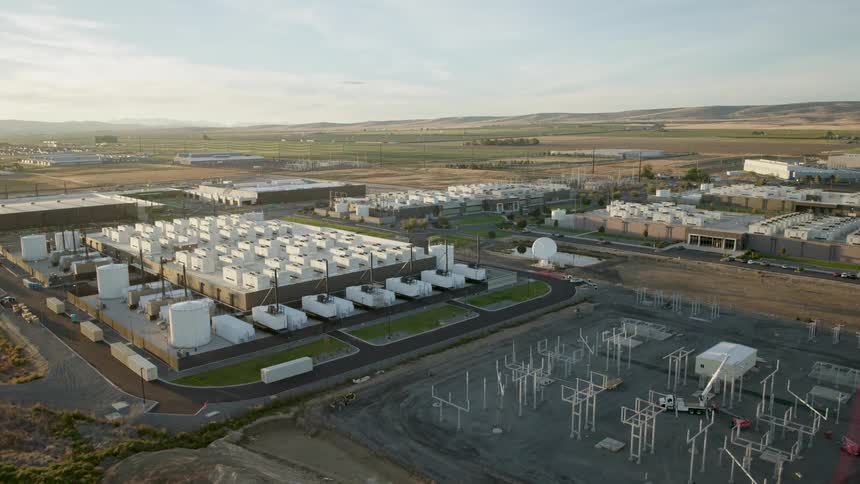A new electrical substation is being constructed next to a new corporate data center facility