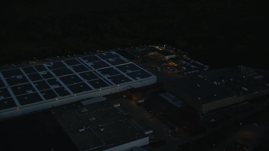 The lights are on around the factory
