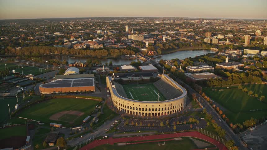 Aerial view of an american football stadium by a river