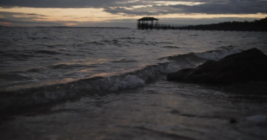View of the sea with calm waves under a morning sky