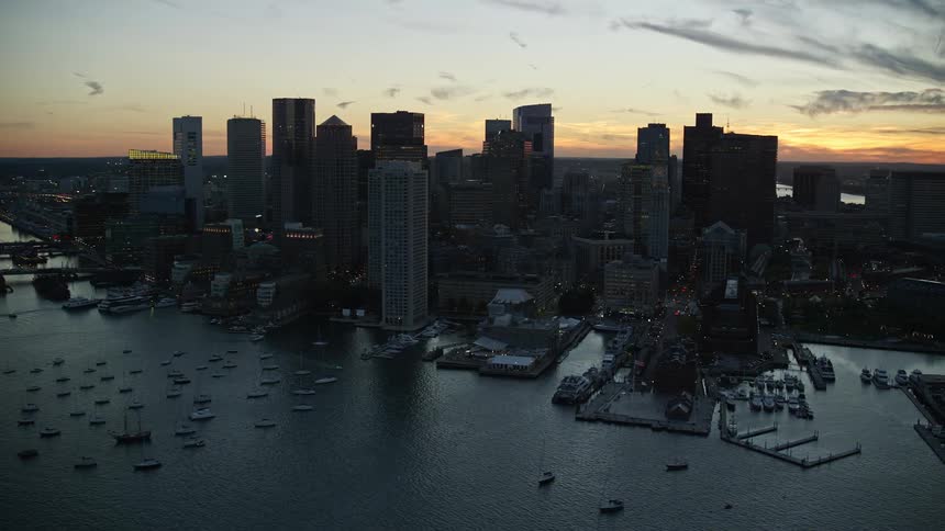 Aerial panorama of a metropolis by the sea with the morning sky
