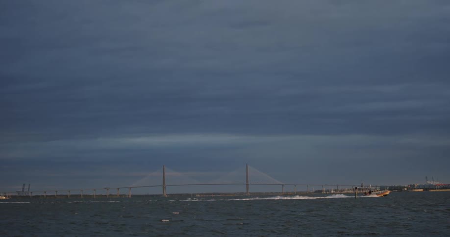 A large city bridge over a wide river