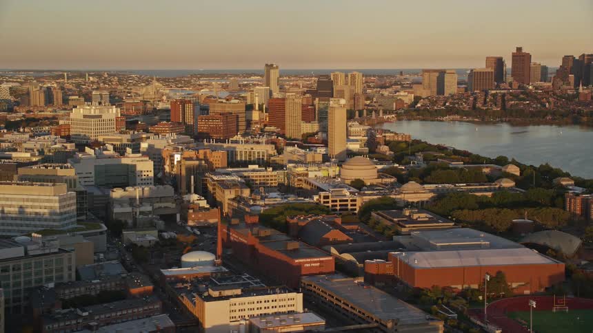 Aerial panorama of a city by a lake in the morning