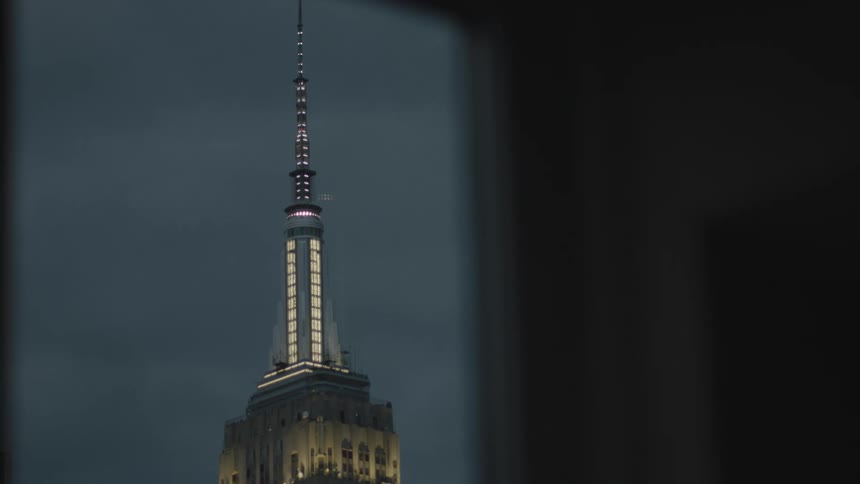View of an illuminated building tower at night
