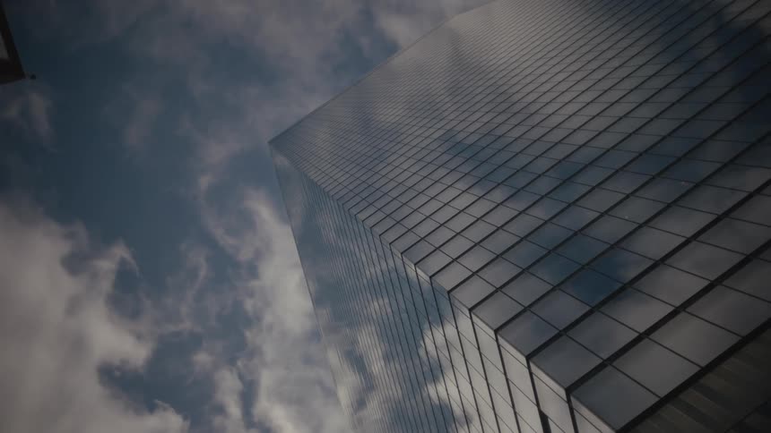 Glass windows building exterior on cloudy day