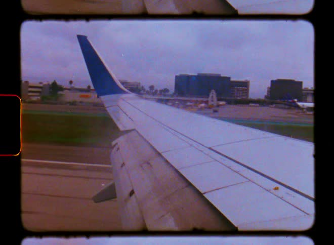 View of an airplane landing at an airport