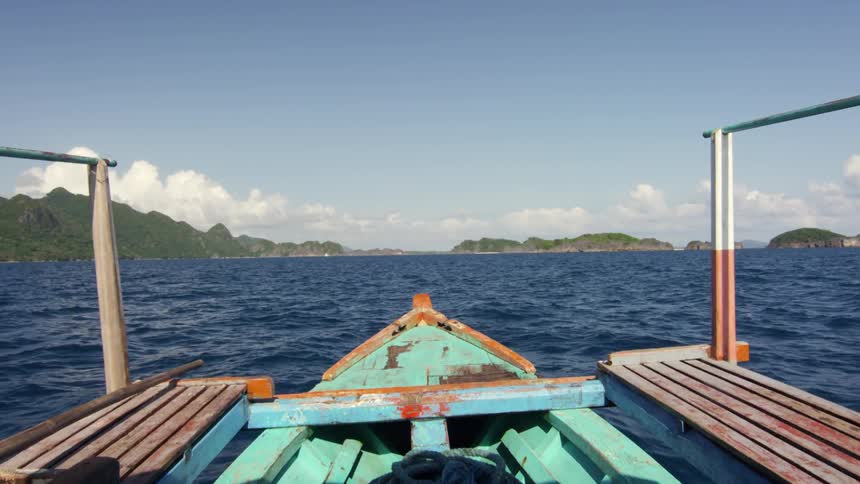A small boat is moving in the water