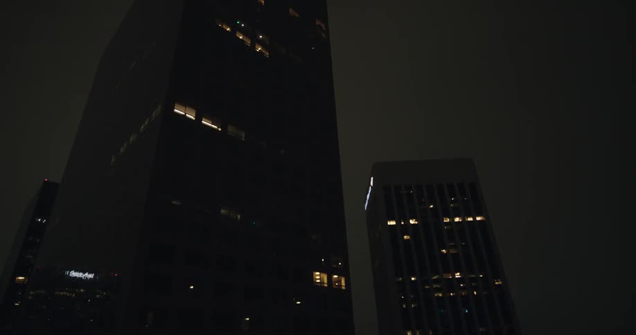 Several tall buildings in a metropolitan city in one night