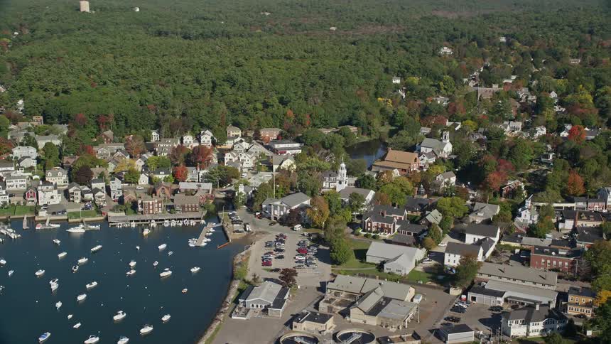 Aerial panorama of an urban city by the seaside with yachts