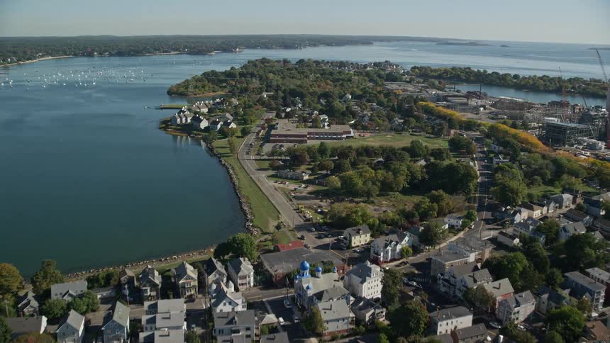 An aerial panorama of an urban city by the seaside