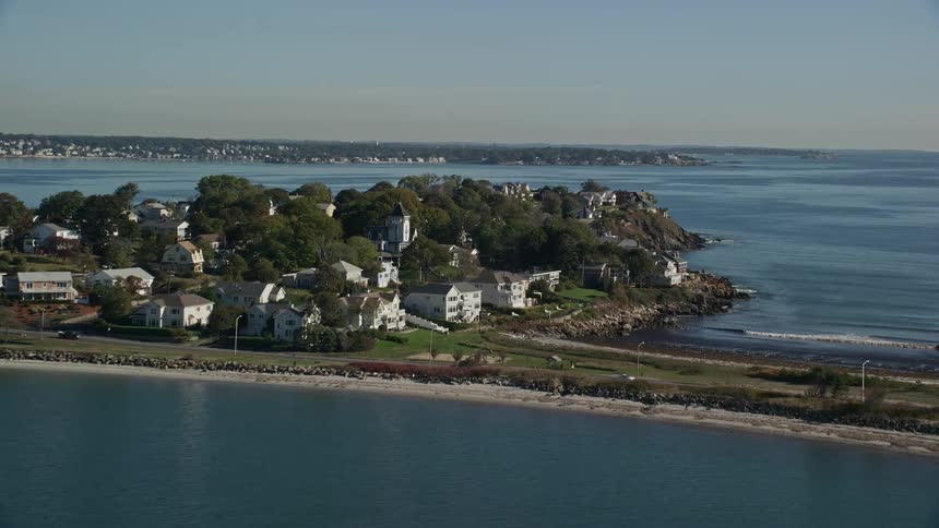 Aerial panorama of an urban city on a small island surrounded by the sea