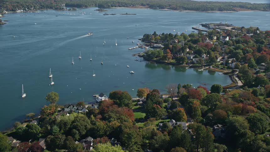 Causeway connects residential neighborhood on island during fall