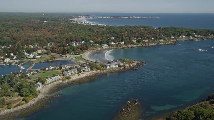 Aerial view of a small coastal town next to the ocean