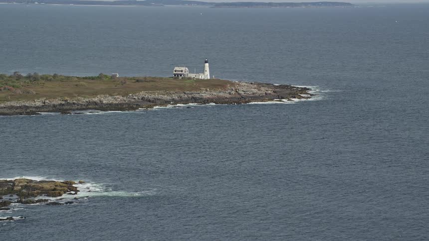 Aerial panorama of the sea with the coastline and a lighthouse