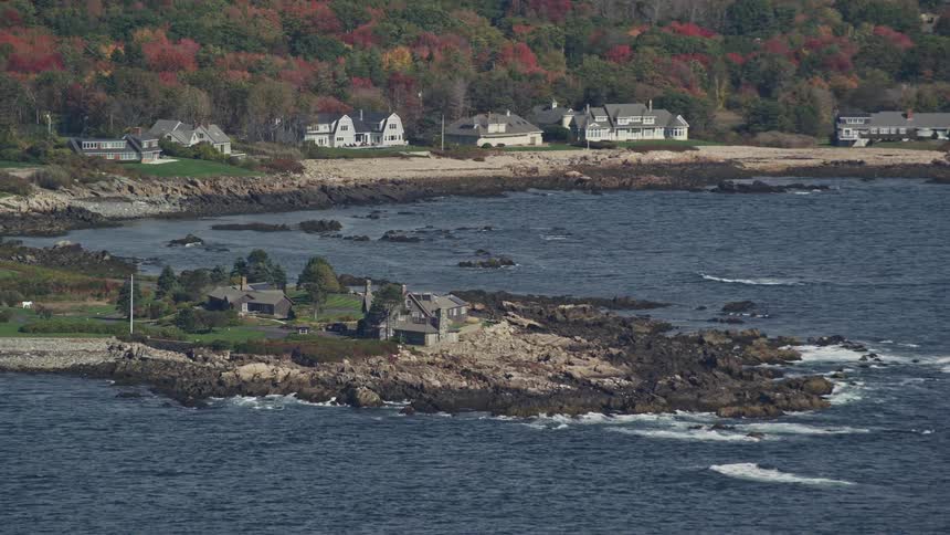 Homes are on the shore of the beach