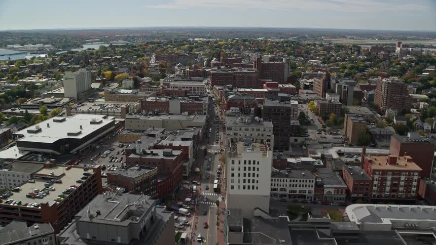Aerial view of a parking lot and downtown area in the city