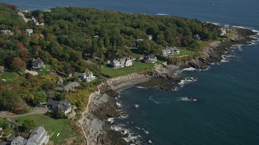 Aerial view of a small coastal town next to the ocean
