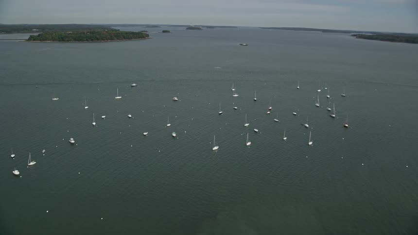 Aerial panorama of the coastal area and the sea with several yachts