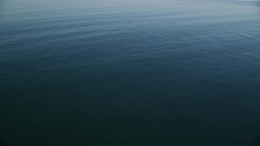 Aerial view of a body of blue water