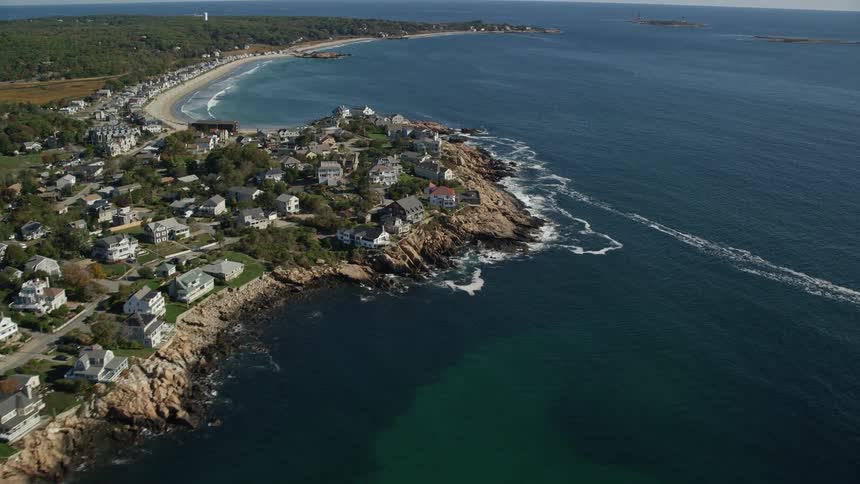 The shore is covered with homes