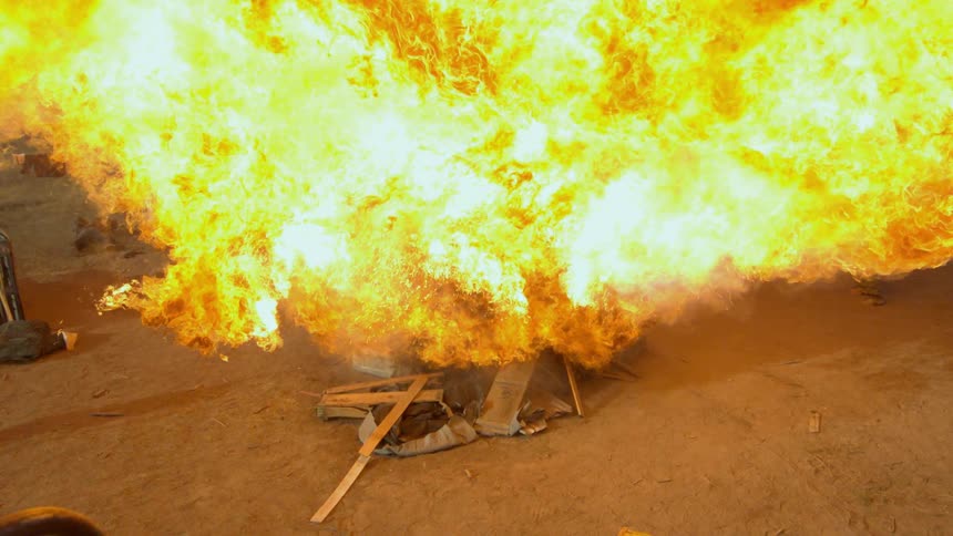 Soldiers are engulfed in a huge explosion