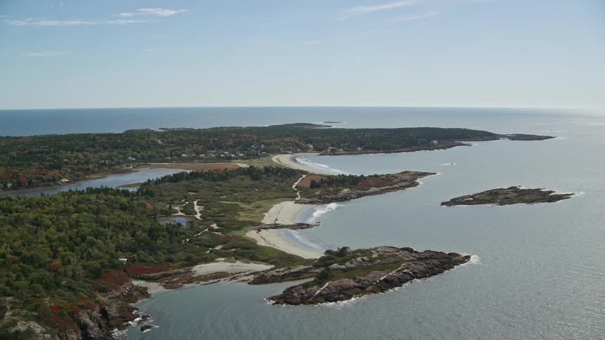 A huge island in front of the sea with rivers passing through it