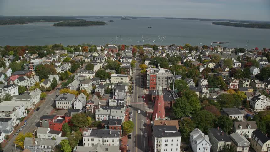 Aerial panorama of an urban city by the seaside