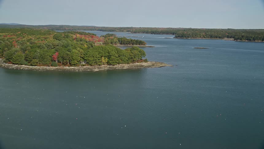 Aerial panorama of a sea and entire forested peninsulas