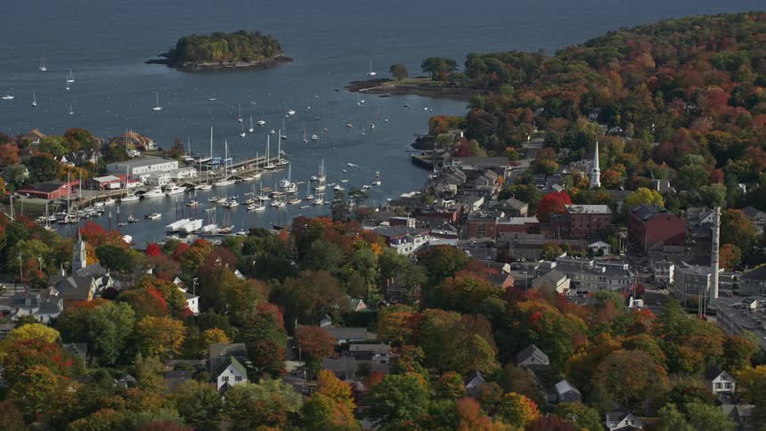 A marina is near the shore of the town