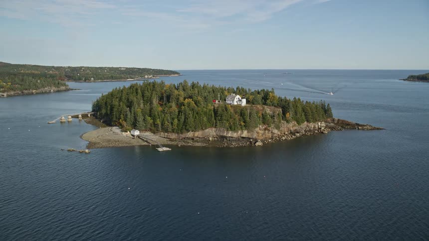 Aerial panorama of an isolated house in the middle of an island