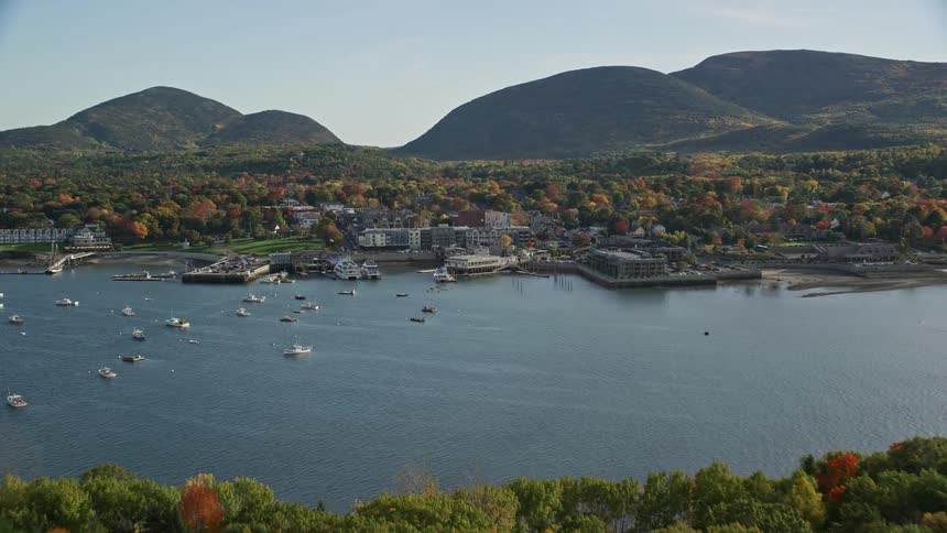 Aerial view of a small coastal town next to the ocean