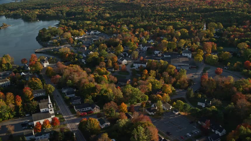Aerial view of a small coastal town next to the ocean