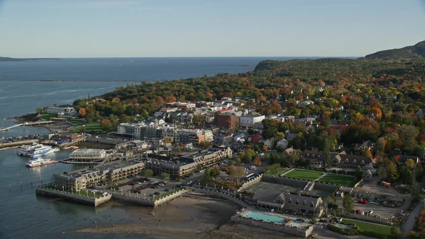 A large marina is on the shore of the island