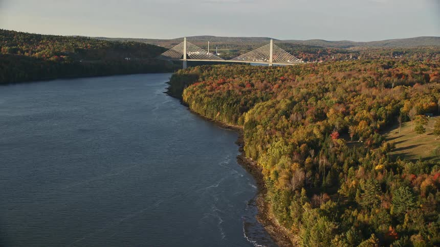 Aerial view of penobscot narrows bridge over the river and brown trees