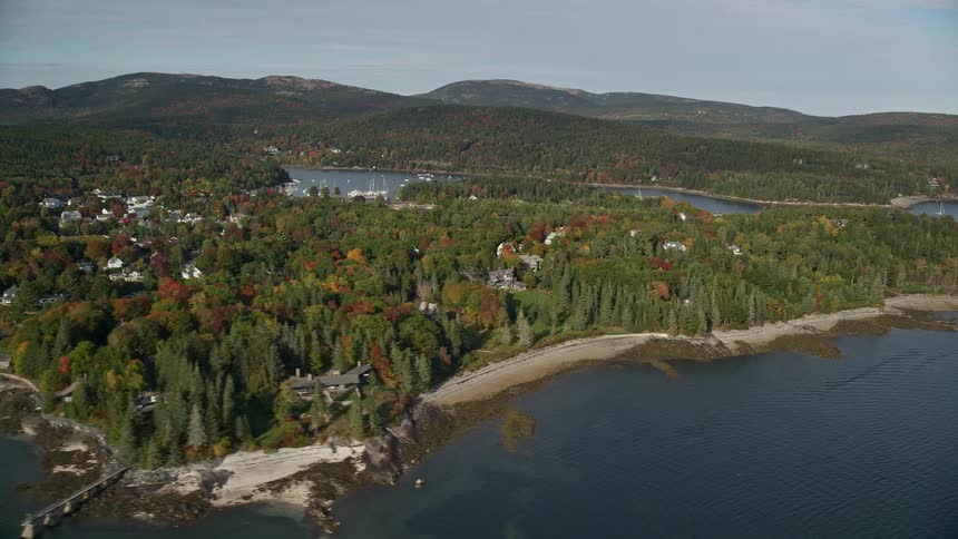 The islands are covered in trees with few homes