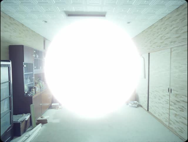 A room lite up with a sphere bright light