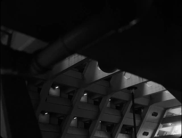 Concrete walls of a building with many windows